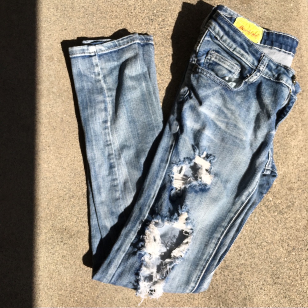 Distressed denim jeans